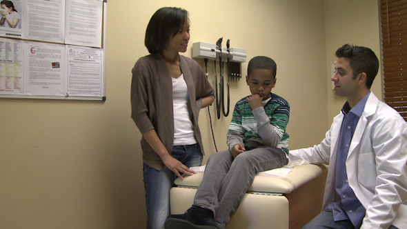 Doctor Diagnoses A Young Boy (7 Of 10)