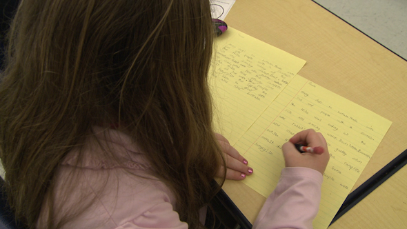 Grammar School Student Doing Homework In Classroom (4 Of 6)