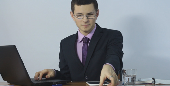 Young Businessman Working with Business Papers