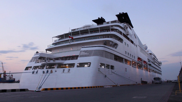 White Cruise Ship Docked in the Port