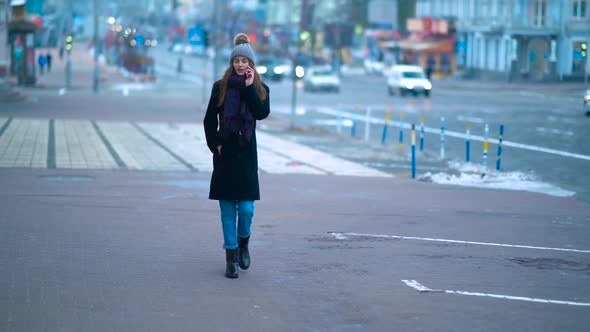 Girl Walking Down The Street Winter