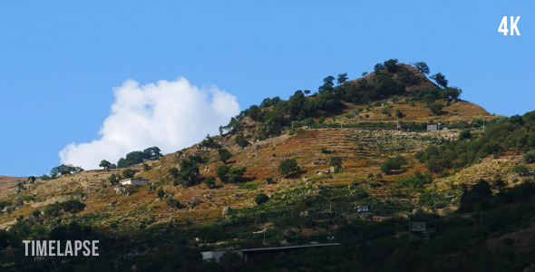 Green Hill And Clouds