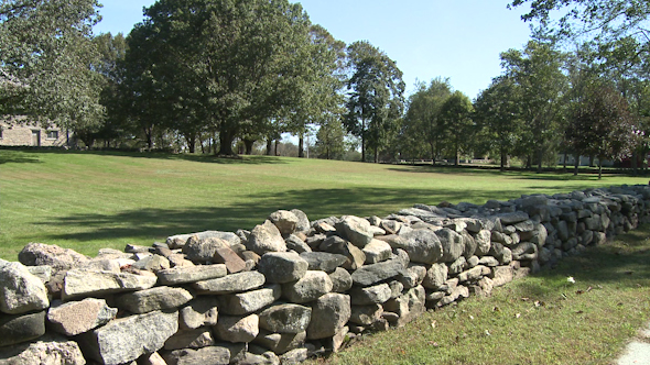 Stone Wall Around A Home With Grassy Field And Trees (1 Of 2)