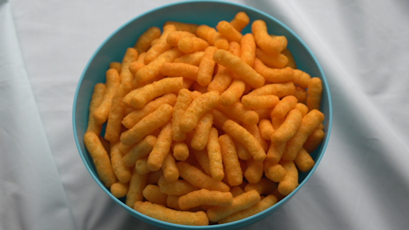 Eating A Bowl Of Cheese Puffs (3 Of 3)