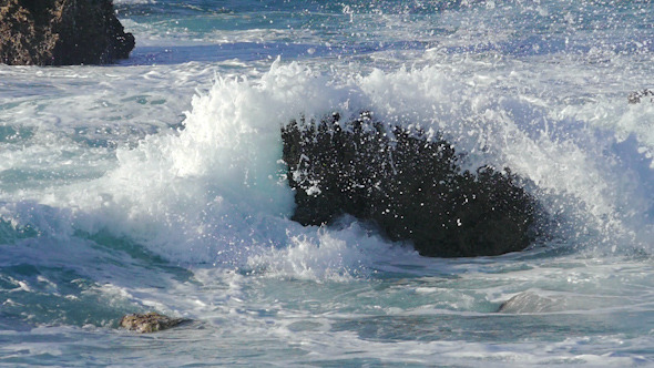 Waves Crashing on Stone Beach