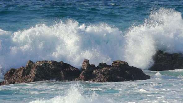 Waves Crashing on Stone Beach