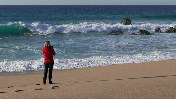 Woman Make Photo Waves in Ocean 