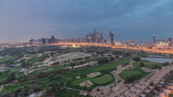 Dubai Marina Skyscrapers and Golf Course Night to Day Timelapse Dubai United Arab Emirates