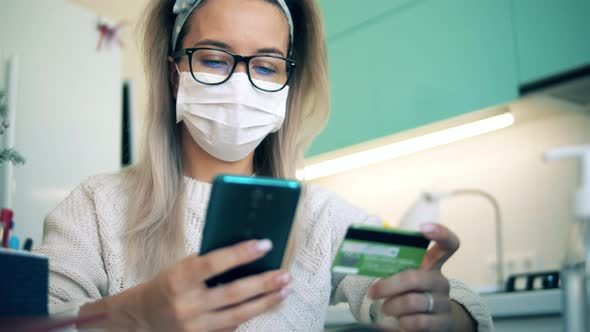 Woman Shops Online While Staying Home During Pandemic.