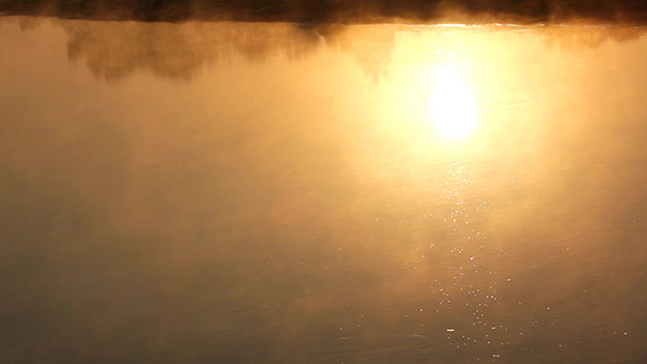Sunrise Reflection In The River With Mist