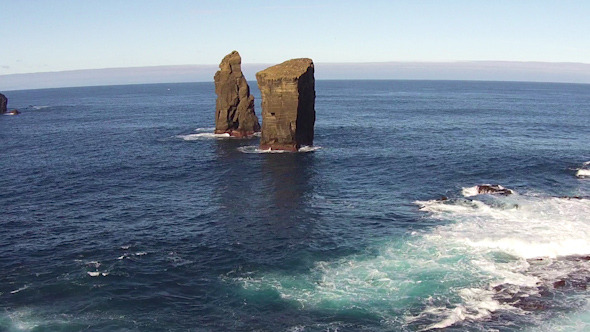 Flying over the High Cliffs and Ocean Waves