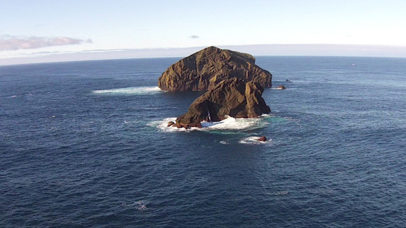 Flying over the High Cliffs and Ocean Waves