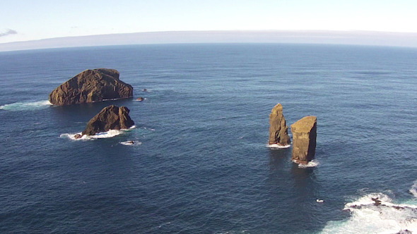 Flying over the High Cliffs and Ocean Waves alt