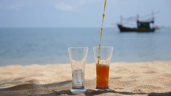 Juice with Ice on Sea Beach