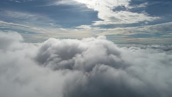 Fog morning at downtown district. Above the clouds.