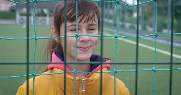 Happy teen on playground. 