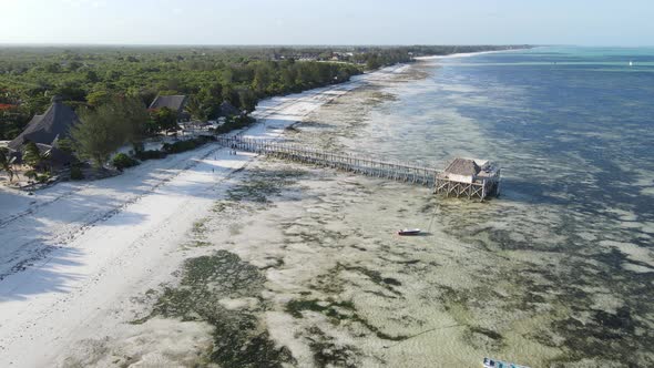 Aerial View of a House on Stilts in the Ocean on the Coast of Zanzibar Tanzania Slow Motion