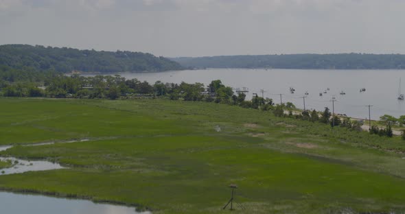 Rising Aerial Pan of Boats Anchored on Cold Spring Harbor Long Island