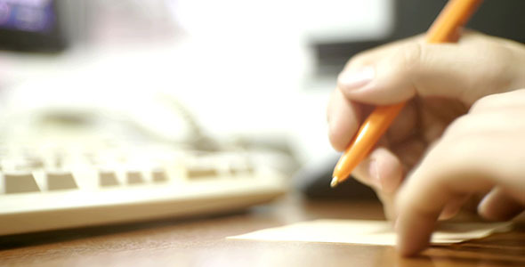 Making A Note On A Paper Stick alt