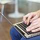 Man Sitting and Working on a Laptop - VideoHive Item for Sale