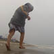 Mother And Son Running On A Rainy Beach - VideoHive Item for Sale