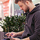 Student Working on a Tablet in Shopping Center. - VideoHive Item for Sale