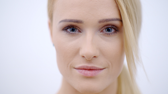 Close Up Smiling Face Of Pretty Blond Female