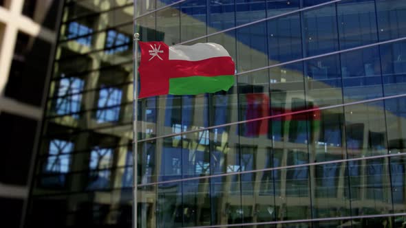 Oman Flag Waving On A Skyscraper Building