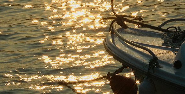 Fishing Boat and Sun Reflection on Sea