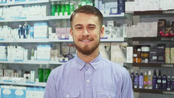 The Man Made a Purchase in a Drugstore and Showing Thumbs Up