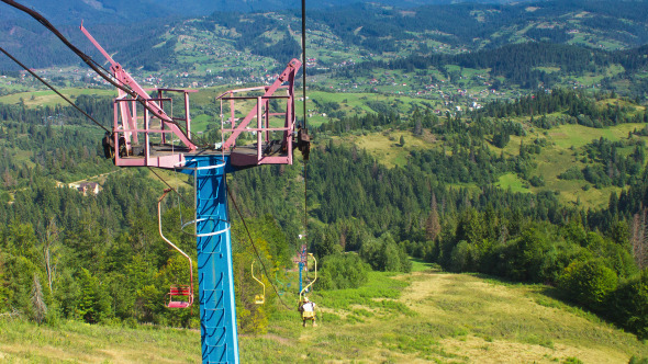 Chair Lift In Mountains