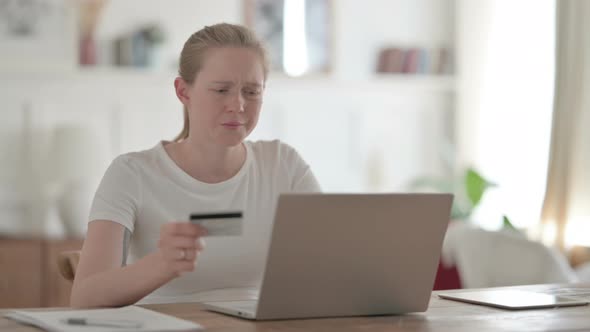 Beautiful Young Woman Having Fail Online Payment on Laptop