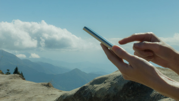 Use Smartphone On Mountain