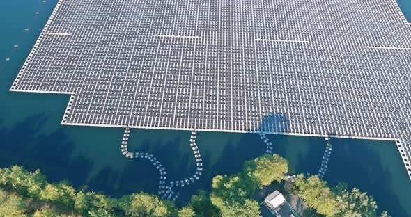 Aerial View of Lake in Renewable Alternative Electricity on Floating Solar Panels Platform