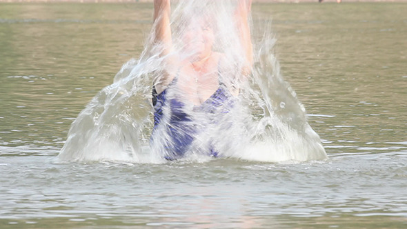 Woman With Overweight Bath In River