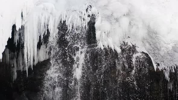 Glacier waterfall in winter.