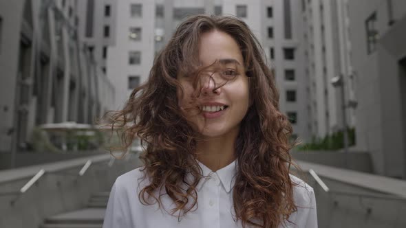 Portrait Of Young Girl On City Street