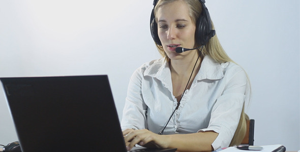 Call Center Operator Working in Office