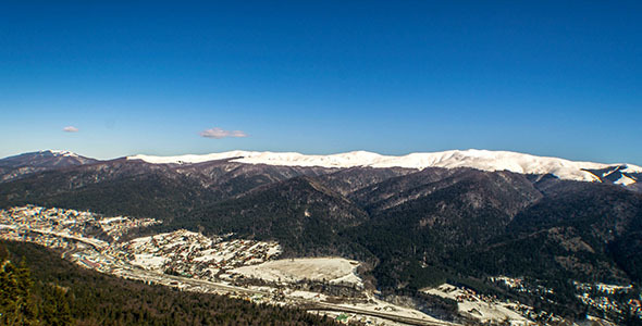 City Under the Mountain in a Sunny Day