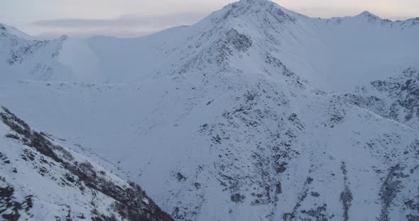 Wide helicopter shot above glacier, fly over water, drone footage