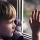 Sad Little Boy Lonely Child With Bear Near Looking Through Window The Little Child Boy is Depressed - VideoHive Item for Sale