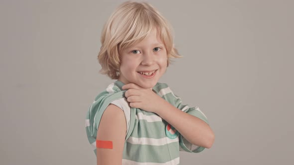 Portrait of Caucasian Boy after Vaccination