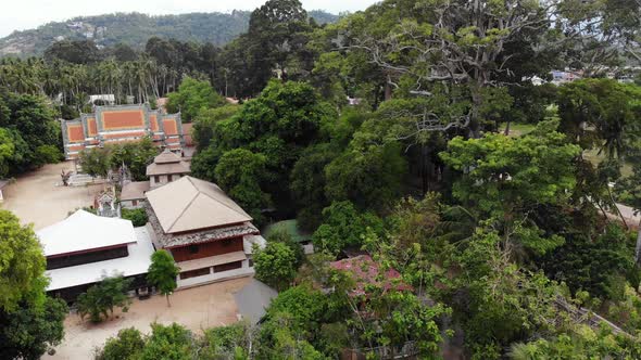 Classic Buddhist Temple Between Forest. From Above Drone View Classic Buddhist Monastery Between