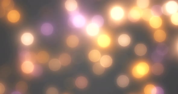 Background With Beautiful Golden Bokeh Circles And Rain Fall Light Ray Slow Motion Loop Able