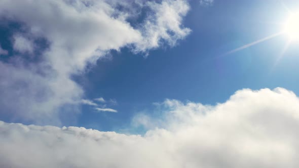 Flight through the moving cloudscape. Texture of clouds. Panoramic view. Clouds in motion	