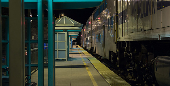 Train Pulls into Station at Night