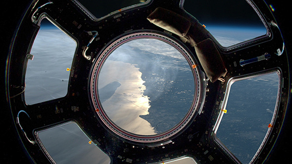 Earth As Seen Through Window Of Space Station