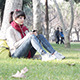 Girl Listening to Music in the Park - VideoHive Item for Sale
