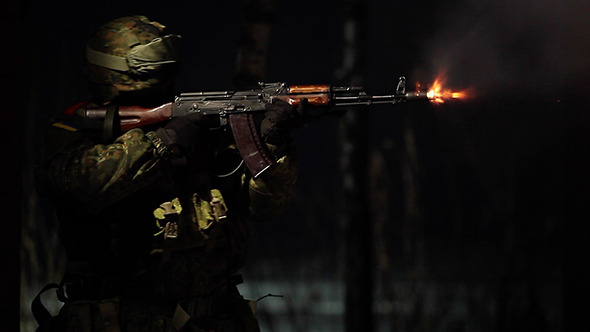 The Soldier Fires His Machine at Night