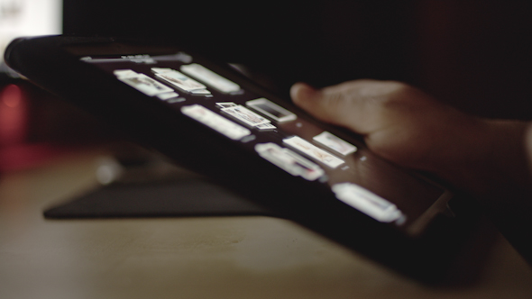 Man Browsing On Tabet 3 alt